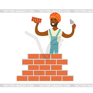 Smiling worker building brick wall, colorful - vector image