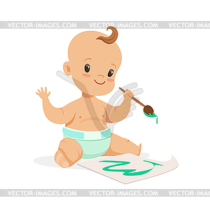 Happy baby in diaper painting with paintbrush and - vector clipart