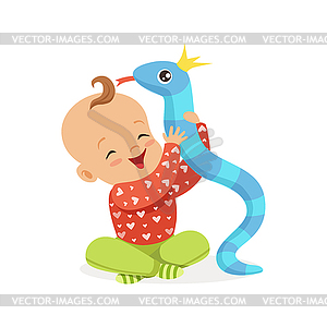 Sweet smiling baby playing with toy snake, - vector clip art