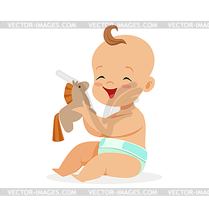 Adorable happy baby in diaper sitting and playing - vector clipart