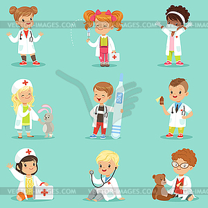 Adorable kids playing doctor set. Smiling little - vector image