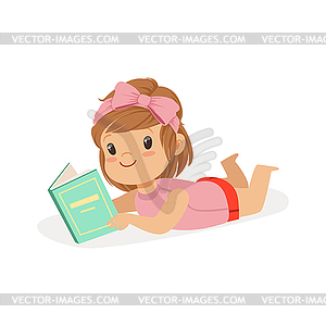 Sweet little girl lying on her stomach and reading - vector EPS clipart