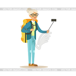 Active senior woman with backpack making selfie on - color vector clipart