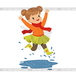 Cute little girl playing on puddle wearing rubber - vector clip art