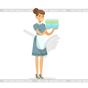 Smiling maid character wearing uniform holding stac - vector EPS clipart