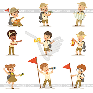 Set of girls and boys in scout costumes - vector image