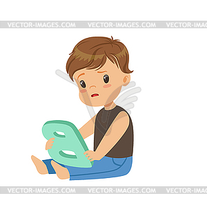Sad little boy sitting on floor and trying correctl - vector EPS clipart