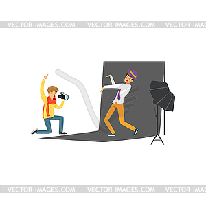 Photographer sitting on his knee and holding - vector clipart