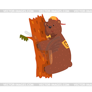 Smiling wild bear hugging tree trunk. Cartoon anima - vector clipart