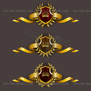 Golden shields with laurel wreath - vector image