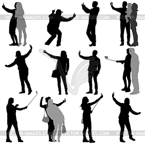 Set silhouettes man and woman taking selfie with - vector EPS clipart