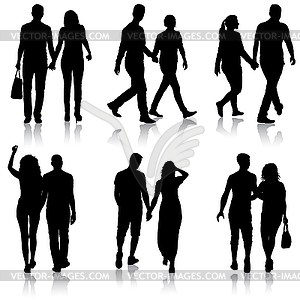 Set Silhouette man and woman walking hand in hand - vector EPS clipart