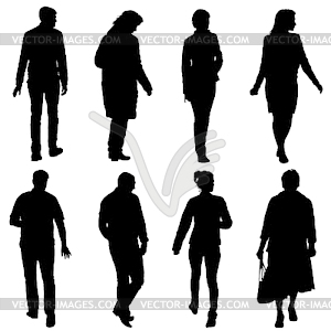 Black silhouette group of people standing in variou - vector clip art