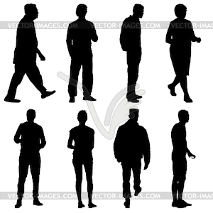 Black silhouette group of people standing in variou - vector clipart