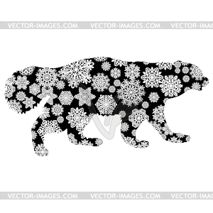 Christmas card of wolverine in snowflakes - vector image