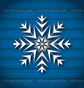 Geometric snowflake on wooden background - vector clipart