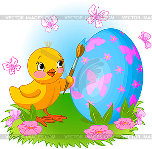 Chicken is painting Easter egg - vector clipart