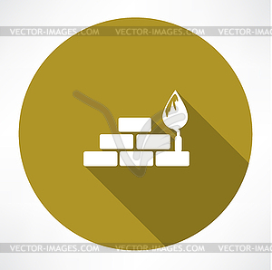 Bricks and trowel icon - vector clip art