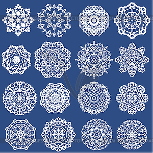 Set of Decorative paper snowflakes. White on blue - vector EPS clipart