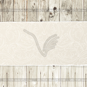 Torn paper on wooden texture - vector clip art