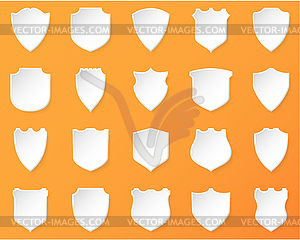 Shiny White Shields on Orange Background - vector clipart