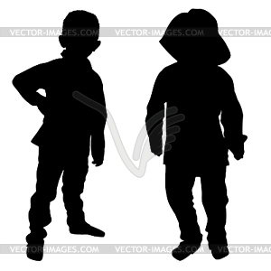 Silhouettes of two little boys - vector clipart / vector image