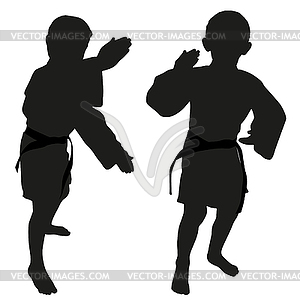 Silhouettes of two little boys - vector clipart / vector image