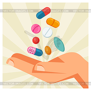 Hand holding various pills and capsules - vector clipart