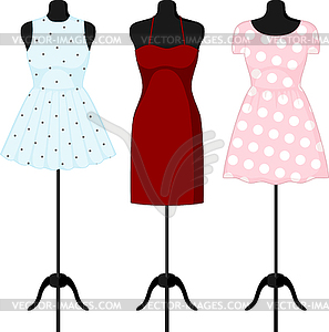 Different dresses on mannequin - vector image