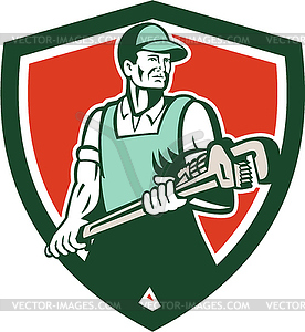 Plumber Holding Giant Wrench Retro Shield - royalty-free vector image