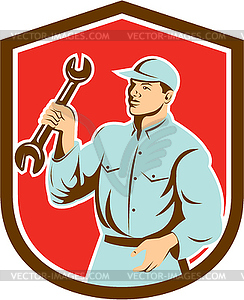 Mechanic Holding Spanner Wrench Shield Retro - vector clipart