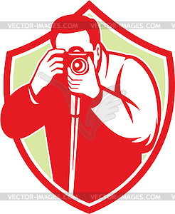 Photographer Shooting Camera Shield Retro - vector EPS clipart