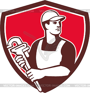 Plumber Wielding Monkey Wrench Shield Retro - vector image