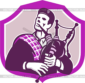 Scotsman Playing Bagpipes Shield Retro - vector clipart