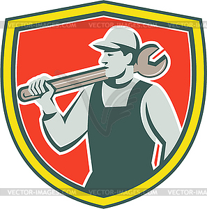 Mechanic Worker Holding Spanner Shield Retro - vector clipart