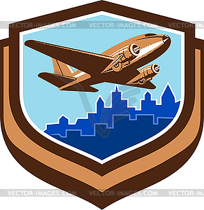 Vintage Airplane Take Off Cityscape Shield Retro - vector clip art