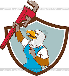 Eagle Plumber Raising Up Pipe Wrench Crest Cartoon - vector clipart