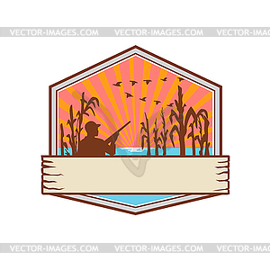 Duck Hunter in Cornfield Shield Retro - vector clipart / vector image