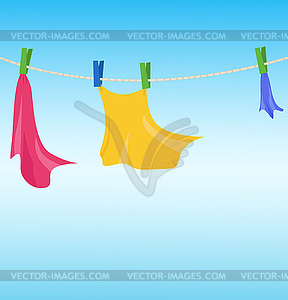 Clothes drying on clothesline - vector image