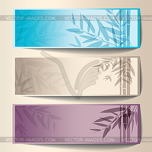 Colorful banners with tree branches - royalty-free vector clipart