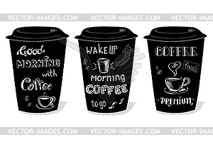 Black coffee cup covered with hand-drawings on them - vector image