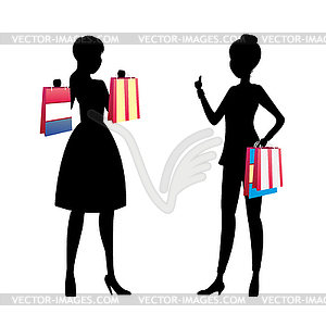 Fashion girls silhouette with shopping bags talking - vector clipart