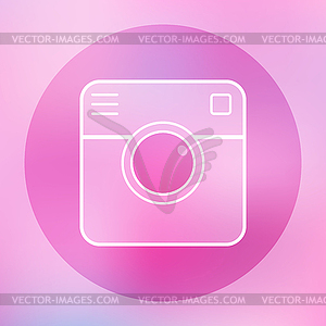 Camera icon on blurred background - vector clipart