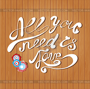 Card with hand lettering text All you need is love - vector EPS clipart