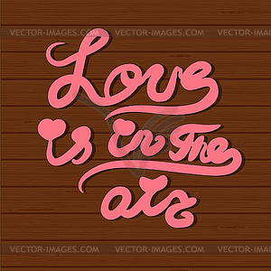 Card with hand lettering text All you need is love - vector clipart