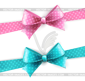 Blue and pink polka dots bow - vector clip art