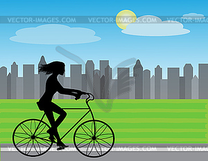 Woman on a bicycle - vector clipart