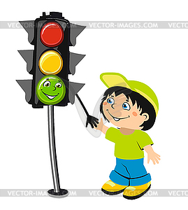 Cartoon boy and traffic light - vector clipart