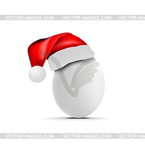 Chicken or ostrich egg with santa claus hat - vector clipart