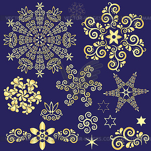 Set of golden snowflakes and elements - vector image